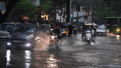 Waterlogged JM road in Pune on Friday. (HT PHOTO)