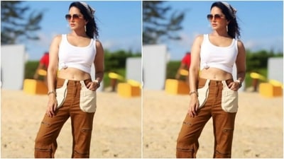 In silver hoop earrings, a bracelet, a printed bandana and white sneakers, Sunny further accessorised her look for the day. (Instagram/@sunnyleone) In silver hoop earrings, a bracelet, a printed bandana and white sneakers, Sunny further accessorised her look for the day. (Instagram/@sunnyleone)