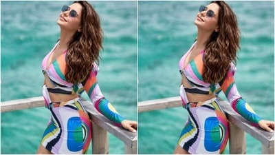 In tinted shades, barefoot and open tresses styled in beach wavy curls, Aamna perfectly accessorised her look. (Instagram/@aamnasharifofficial)