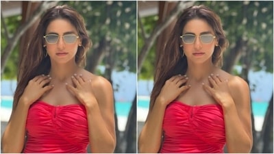 Aamna decked up in the off-shoulder pink dress with gathered up details and added a hat as an accessory to her beach look. (Instagram/@aamnasharifofficial)
