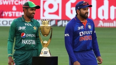 India's Rohit Sharma and Pakistan's Babar Azam pose with the Asia Cup trophy after the toss (REUTERS)