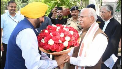 Punjab chief minister Bhagwant Mann greeting his Haryana counterpart Manohar Lal Khattar as the two leaders met for talks on the contentious Sutlej-Yamuna Link Canal issue in Chandigarh on Friday. (HT Photo) Punjab chief minister Bhagwant Mann greeting his Haryana counterpart Manohar Lal Khattar as the two leaders met for talks on the contentious Sutlej-Yamuna Link Canal issue in Chandigarh on Friday. (HT Photo)