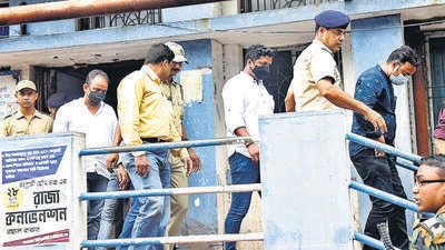 Howrah: West Bengal police personnel detain three Jharkhand Congress MLAs after a huge amount of cash was found in their vehicle on Saturday, in Howrah district, Sunday, July 31, 2022. (PTI Photo)(PTI07_31_2022_000290B) (PTI) Howrah: West Bengal police personnel detain three Jharkhand Congress MLAs after a huge amount of cash was found in their vehicle on Saturday, in Howrah district, Sunday, July 31, 2022. (PTI Photo)(PTI07_31_2022_000290B) (PTI)