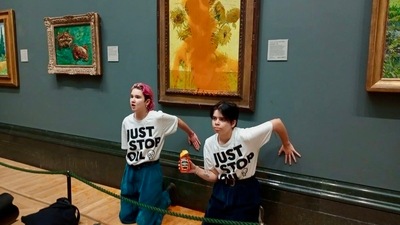 Image posted by the ‘Just Stop Oil’ group on Twitter after throwing soup over Van Gogh's “Sunflowers" painting in National Gallery, London. Image posted by the ‘Just Stop Oil’ group on Twitter after throwing soup over Van Gogh's “Sunflowers" painting in National Gallery, London.