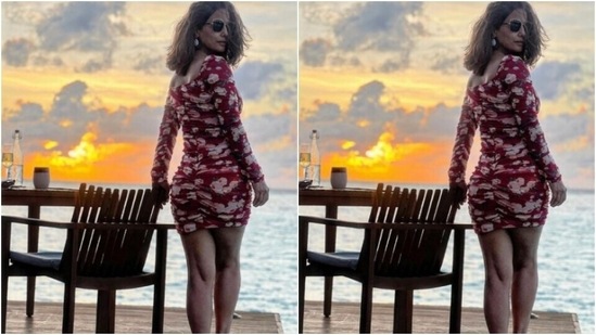 “Catch the glimpse,” wrote Hina as she posed with the backdrop of a sunset and the blue waters of the sea.(Instagram/@realhinakhan)
