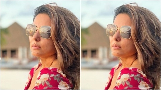 Hina’s red dress featured floral patterns in white, and came with a plunging neckline, full sleeves and gathered up details below the waist.(Instagram/@realhinakhan)