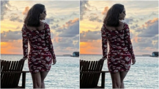 Hina, for catching the glimpse of the stunning sunset, opted for a little red summer dress as she posed for the cameras.(Instagram/@realhinakhan)