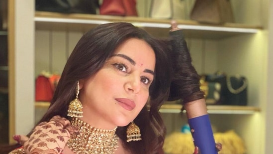 Shraddha Arya getting ready for Karwa Chauth. She attended Ankita Lokhande's party after the festivities and had to break her fast with a virtual call to her husband.