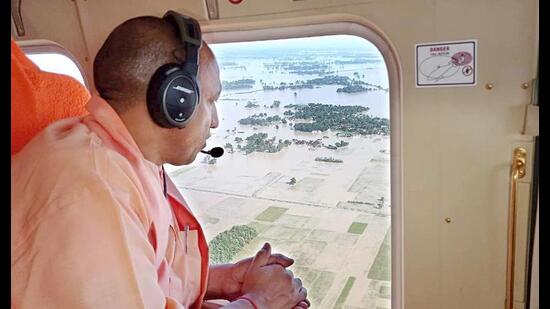 Uttar Pradesh chief minister Yogi Adityanath conducts an aerial survey of the flood-affected areas of Siddharthnagar, Basti and Sant Kabir Nagar, on Thursday. (ANI Photo)