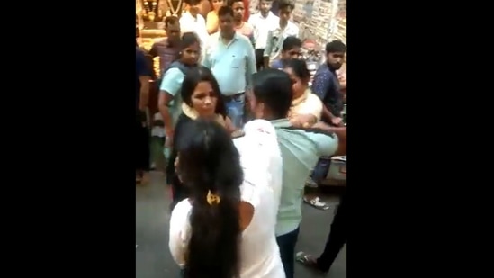 The fight unfolded in full public view at a market in Ghaziabad, Uttar Pradesh. (Yogyesh Tiwari/Twitter)