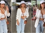 Malaika Arora poses for the paparazzi at the airport in a uber-stylish outfit. Malaika Arora poses for the paparazzi at the airport in a uber-stylish outfit. 
