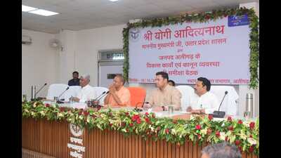 Chief minister Yogi Adityanath at a review meet in Aligarh on Saturday. (HT PHOTO)