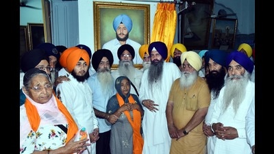 In presence of various Sikh personalities, the SGPC president Harjinder Singh Dhami unveiling the portrait of slain Babbar Khalsa International (BKI) militant Balwinder Singh Jatana who assassinated officials of SYL canal, in Central Sikh Museum of Golden Temple, Amritsar, on Saturday. (Photo by Sameer Sehgal /Hindustan Times) In presence of various Sikh personalities, the SGPC president Harjinder Singh Dhami unveiling the portrait of slain Babbar Khalsa International (BKI) militant Balwinder Singh Jatana who assassinated officials of SYL canal, in Central Sikh Museum of Golden Temple, Amritsar, on Saturday. (Photo by Sameer Sehgal /Hindustan Times)