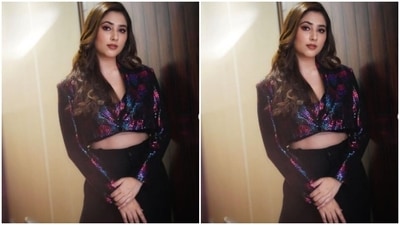 Disha further teamed her cropped top with a pair of high-waisted black trousers with wide legs. (Instagram/@dishaparmar) Disha further teamed her cropped top with a pair of high-waisted black trousers with wide legs. (Instagram/@dishaparmar)