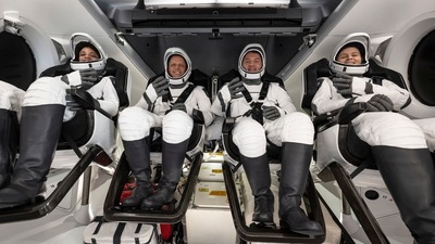 NASA astronauts Jessica Watkins, Robert Hines, Kjell Lindgren, and ESA (European Space Agency) astronaut Samantha Cristoforetti inside the SpaceX Crew Dragon Freedom spacecraft. (AFP)