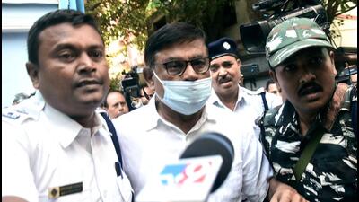 Kolkata, Oct 11 (ANI): Trinamool Congress MLA and former president of West Bengal Primary Education Board, Manik Bhattacharya being produced at Bankshall Court for his alleged role in the School Service Commission (SSC) recruitment scam in the state, in Kolkata on Tuesday. (ANI Photo) (Utpal Sarkar)