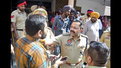 Police officials with applicants during the draw of lots of temporary licences for the sale of firecrackers at the DC office in Ludhiana on Saturday. (Harvinder Singh/Hindustan Times) Police officials with applicants during the draw of lots of temporary licences for the sale of firecrackers at the DC office in Ludhiana on Saturday. (Harvinder Singh/Hindustan Times)