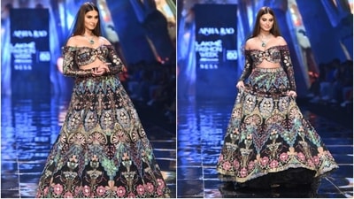Tara accessorised her showstopper look with high heels and a statement neckpiece adorned with an emerald stone. Lastly, she chose a net embroidered veil adorned on her open locks, smoky eye shadow, nude lips, mascara on the lashes, winged eyeliner, and glowing skin for the glam picks. (HT Photo/Varinder Chawla) Tara accessorised her showstopper look with high heels and a statement neckpiece adorned with an emerald stone. Lastly, she chose a net embroidered veil adorned on her open locks, smoky eye shadow, nude lips, mascara on the lashes, winged eyeliner, and glowing skin for the glam picks. (HT Photo/Varinder Chawla)