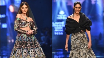 Tara Sutaria and Genelia D'Souza walked the ramp at the FDCI (Fashion Design Council of India) Lakme Fashion Week for designers Aisha Rao and Varun & Nidhika today, October 15. The two stars turned showstoppers at the occasion dressed in beauteous ensembles that screamed elegance and breathtaking beauty. While Tara owned the ramp in an embroidered floral lehenga, Genelia grabbed eyeballs in a gorgeous statement blouse and lehenga skirt set. (HT Photo/Varinder Chawla) Tara Sutaria and Genelia D'Souza walked the ramp at the FDCI (Fashion Design Council of India) Lakme Fashion Week for designers Aisha Rao and Varun & Nidhika today, October 15. The two stars turned showstoppers at the occasion dressed in beauteous ensembles that screamed elegance and breathtaking beauty. While Tara owned the ramp in an embroidered floral lehenga, Genelia grabbed eyeballs in a gorgeous statement blouse and lehenga skirt set. (HT Photo/Varinder Chawla)