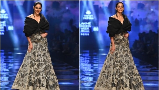 Genelia's blouse comes in a black hue and features an off-shoulder neckline, layered silhouette and a cropped hem. She wore it with a grey-coloured A-line skirt adorned in a black motif print and a floor-grazing length.(HT Photo/Varinder Chawla)