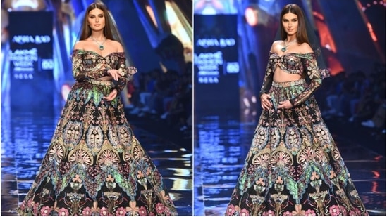 Tara Sutaria slipped into a lehenga set from Aisha Rao's latest collection, which the designer displayed at the Lakme Fashion Week. It features a bralette and skirt adorned with intricate floral motif embroidery and gota patti work. The paparazzi clicked the Ek Villain Returns actor walking the ramp at LFW, and soon, her photos started doing the rounds on social media.(HT Photo/Varinder Chawla)