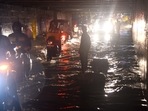 Vehicles wade through a waterlogged subway after heavy rain in Mumbai's Andheri on Friday, (Vijay Bate/HT Photo)