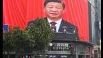 People watch an outdoor screen showing the live speech of Chinese President Xi Jinping, October 16, 2022 (AFP) People watch an outdoor screen showing the live speech of Chinese President Xi Jinping, October 16, 2022 (AFP)