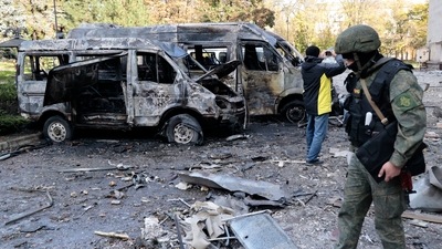 Russia-Ukraine War: Investigators inspect a site after shelling near an administrative building, in Donetsk. (AP)