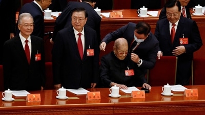 Retired official Song Ping arrives next to Wen Jiabao, former Chinese premier, Zhang Dejiang, former vice premier, and Zeng Qinghong, former vice president. (Reuters)
