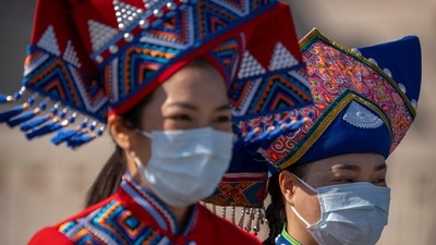 Delegates in ethnic minority dress seen amid the opening ceremony of the National Congress of Communist Party at the Great Hall of the People in Beijing. (AP) Delegates in ethnic minority dress seen amid the opening ceremony of the National Congress of Communist Party at the Great Hall of the People in Beijing. (AP)