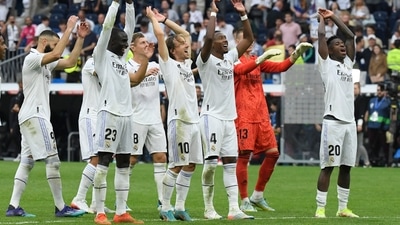 Real Madrid's players celebrate victory after the Spanish League football match between Real Madrid CF and FC Barcelona Real Madrid's players celebrate victory after the Spanish League football match between Real Madrid CF and FC Barcelona