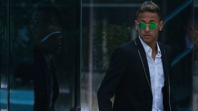 Neymar leaves the national court after testifying in an investigation into alleged irregularities regarding his transfer to Barcelona (AP) Neymar leaves the national court after testifying in an investigation into alleged irregularities regarding his transfer to Barcelona (AP)