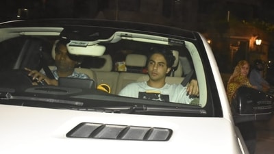 Aryan Khan, son of Shah Rukh Khan and Gauri Khan, was seen giving filmmaker Karan Johar a visit at his residence. He was seen arriving at Karan's house Saturday night. (Varinder Chawla) Aryan Khan, son of Shah Rukh Khan and Gauri Khan, was seen giving filmmaker Karan Johar a visit at his residence. He was seen arriving at Karan's house Saturday night. (Varinder Chawla)