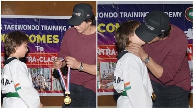 Shah Rukh Khan gave his son AbRam a medal. Shah Rukh Khan gave his son AbRam a medal.