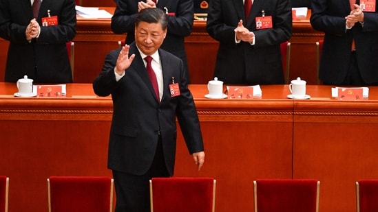 Xi Jinping: China's President Xi Jinping waves as he arrives for the opening session of the 20th Chinese Communist Party's Congress.(AFP)