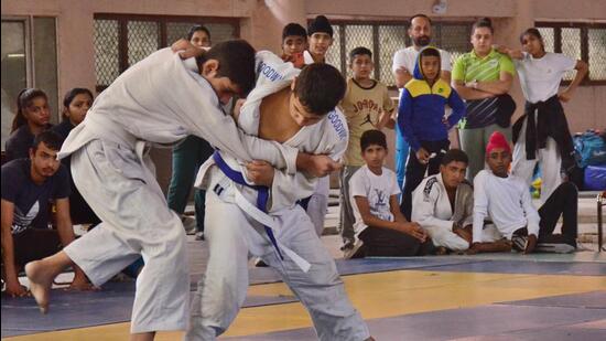 Players in action in the judo contest during the Khedan Vatan Punjab Diyan. Ludhiana is hosting a total of four games— handball, judo, softball and basketball— for the U-14, U-17, U-21 and 21-40 categories (Harvinder Singh/HT)