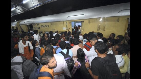 Heavy rush of candidates at a platform at the Charbagh Railway Station a day after the Uttar Pradesh Subordinate Services Selection Commission (UPSSSC) Preliminary Eligibility Test (PET) 2022, in Lucknow on Sunday. (PTI)