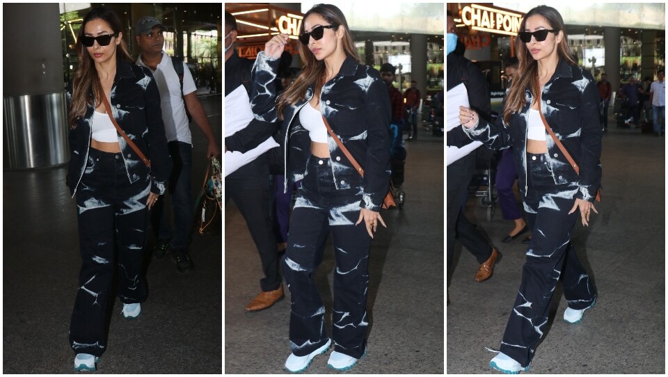 Malaika Arora clicked by the paparazzi at the Mumbai airport.&nbsp; (HT Photo/Varinder Chawla)