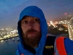 One of the protesters, Morgan Trowland, posted on Twitter a clip of himself at the top of the bridge. One of the protesters, Morgan Trowland, posted on Twitter a clip of himself at the top of the bridge.