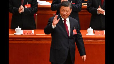 China's President Xi Jinping waves as he arrives for the opening session of the 20th Chinese Communist Party's Congress at the Great Hall of the People in Beijing on October 16, 2022 (AFP) China's President Xi Jinping waves as he arrives for the opening session of the 20th Chinese Communist Party's Congress at the Great Hall of the People in Beijing on October 16, 2022 (AFP)