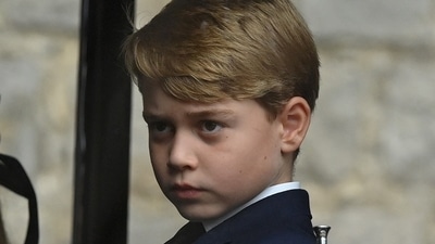 Prince George: Prince George of Wales is seen arriving at St George's Chapel. (Reuters)