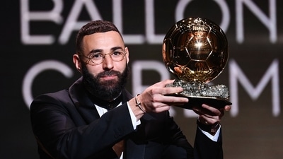 Real Madrid's French forward Karim Benzema receives the Ballon d'Or award during the 2022 Ballon d'Or France Football award ceremony Real Madrid's French forward Karim Benzema receives the Ballon d'Or award during the 2022 Ballon d'Or France Football award ceremony