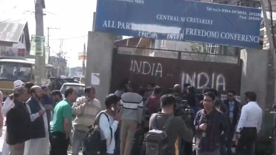 Protestors express their anger by defacing the All Parties Hurriyat office hoarding in Srinagar. (ANI) Protestors express their anger by defacing the All Parties Hurriyat office hoarding in Srinagar. (ANI)