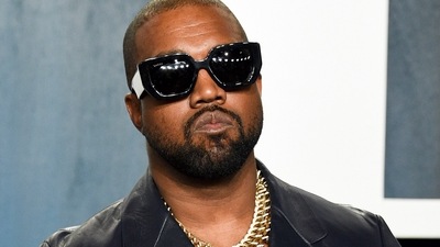 Kanye West arrives at the Vanity Fair Oscar Party. (AP)
