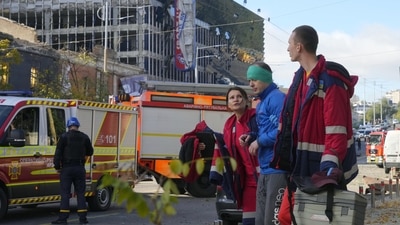 Russia-Ukraine War: An injured man receives medical treatment at the scene of Russian shelling, in Kyiv, Ukraine. (AP) Russia-Ukraine War: An injured man receives medical treatment at the scene of Russian shelling, in Kyiv, Ukraine. (AP)