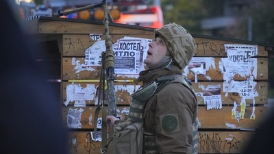 Russia-Ukraine War: A Ukrainian soldier looks on as a drone appears in the sky seconds before it fired on buildings in Kyiv, Ukraine. (AP) Russia-Ukraine War: A Ukrainian soldier looks on as a drone appears in the sky seconds before it fired on buildings in Kyiv, Ukraine. (AP)
