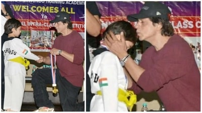 Shah Rukh Khan with Taimur Ali Khan at latter's Taekwondo match. Shah Rukh Khan with Taimur Ali Khan at latter's Taekwondo match.