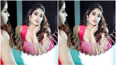Janhvi slipped into a bright pink ensemble to attend the promotions of her film, Mili, in Jaipur. The attire is from the shelves of her favourite designer Manish Malhotra's eponymous label. The star often chooses pieces from his collection while picking ethnic outfits for attending various events, and each look is a win. (Instagram) Janhvi slipped into a bright pink ensemble to attend the promotions of her film, Mili, in Jaipur. The attire is from the shelves of her favourite designer Manish Malhotra's eponymous label. The star often chooses pieces from his collection while picking ethnic outfits for attending various events, and each look is a win. (Instagram)