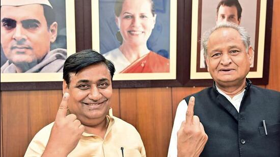 Rajasthan Chief Minister Ashok Gehlot and Rajasthan Congress chief Govind Singh Dotasra show ink-marked fingers after casting their votes for the party's presidential elections, in Jaipur on Monday. (Govind Singh Dotasra Twitter) Rajasthan Chief Minister Ashok Gehlot and Rajasthan Congress chief Govind Singh Dotasra show ink-marked fingers after casting their votes for the party's presidential elections, in Jaipur on Monday. (Govind Singh Dotasra Twitter)