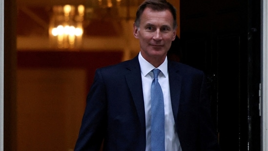 Since taking over the Treasury three days ago, Jeremy Hunt has been outlining a radically different fiscal approach from Truss, saying taxes would have to rise and spending would have to be cut(Reuters)